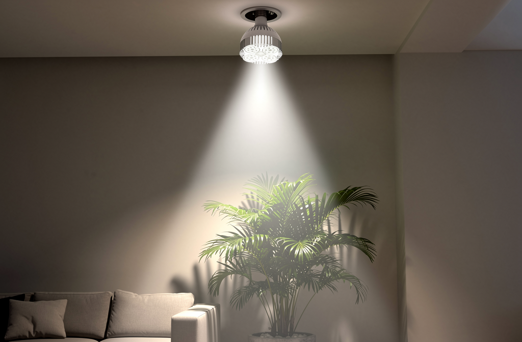 Ampoule LED PAR30 encastrée au plafond éclairant une plante d'intérieur dans un salon moderne.